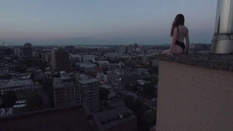 Rooftop Bikini Boudoir Night Sitting Stock Footage 78759850