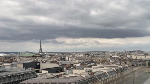 Rooftop City View With Distant Eiffel Tower Under Storm Clouds, Paris, France 4K Stock Footage 160016121