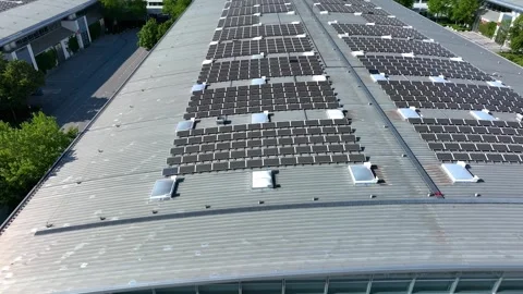 Rooftop of industrial building with solar cells on it. New industrial warehouses Stock Footage 268690183