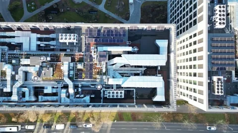 Rooftop of a modern energy-efficient office featuring ventilation systems and Video stock 347791459