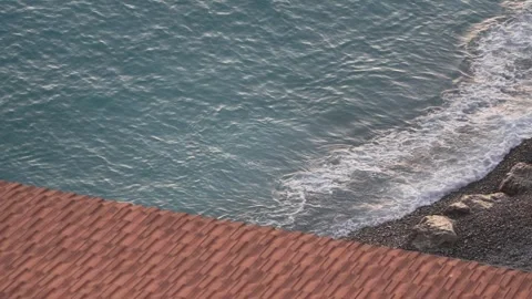 Rooftop Overlooking Ocean Waves in Nice. Video stock 329584938