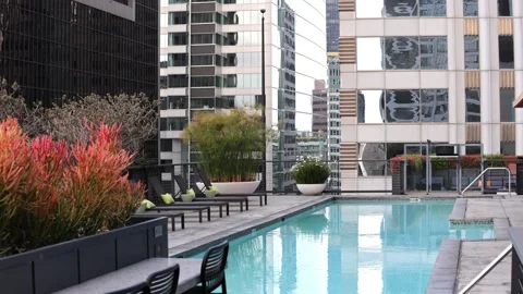 Rooftop Pool Empty Surrounded By Taller Buildings Stock Footage 316773605
