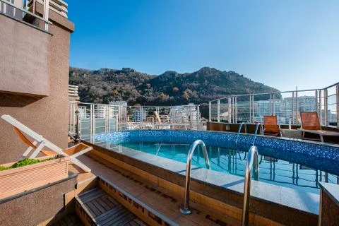 Rooftop Pool with Mountain View. Stock Photos