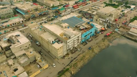 Rooftop Solar Array Towers Over Pakistan's Urban Bazaar Stock Footage 336450870