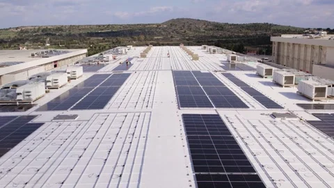 Rooftop solar installation workers evening pull out aerial Stock Footage 331346790