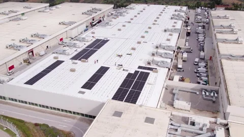 Rooftop solar installation workers orbit aerial Stock Footage 331504941