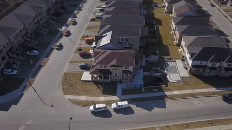 Rooftop solar panels in suburb from drone Stock Footage 105207424