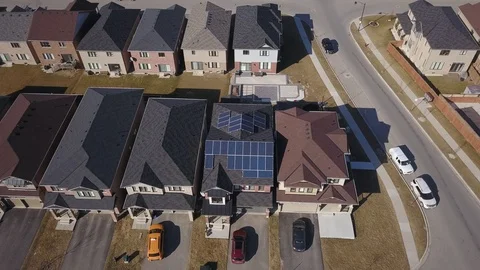 Rooftop solar panels in suburb from drone Stock Footage 105207425