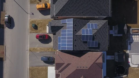 Rooftop solar panels in suburb from drone Stock Footage 105207454