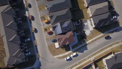 Rooftop solar panels in suburb from drone Stock Footage 105207458
