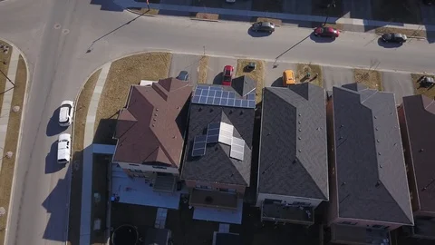 Rooftop solar panels in suburb from drone Stock Footage 105207481