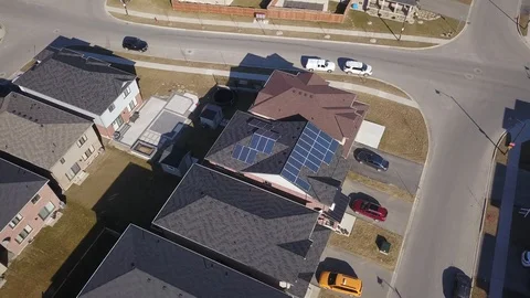 Rooftop solar panels in suburb from drone Stock Footage 105207541