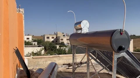 Rooftop Solar Water Heater System with Vacuum Tubes Stock Footage 345611766