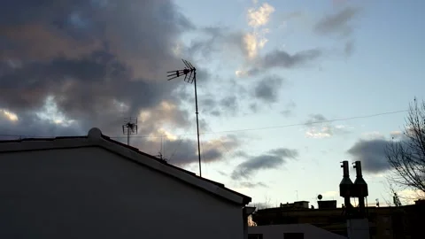 Rooftop sunset orange cloud sky timelapse Stock Footage 146257444