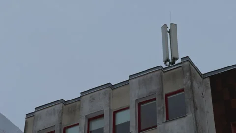 Rooftop with telecom equipment. Maintenance crew inspecting communication Stock Footage 330026196