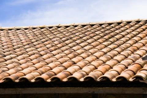 Rooftop tile texture with the sky on the background.  Structure texture backg Stock Photos