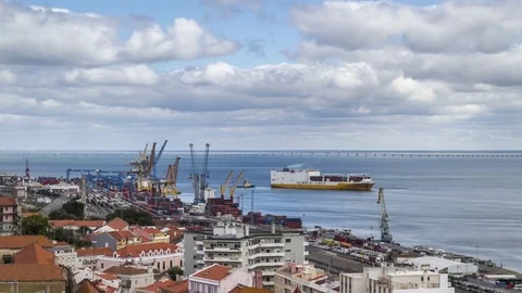 Rooftop timelapse of the Lisbon skyline with cargo seaport. Portugal 스톡 동영상 79813639