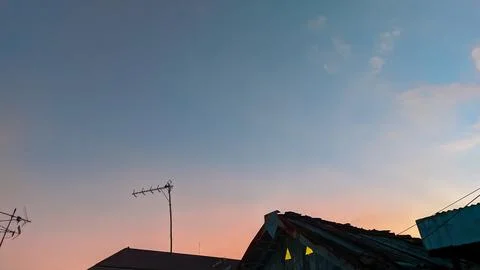 Rooftop twilight with vivid gradient sky Stock Photos