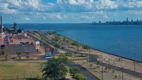 Rooftop vertical view over Encarnación, Paraguay, looking across the Paraná Stock Footage 340194127