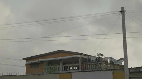 Rooftop view of apartment building, Ivory Coast Stock Footage 333561665