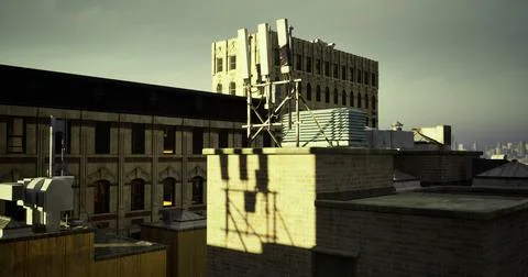 Rooftop view of a historic building under clouded sky in urban setting Ilustración de archivo