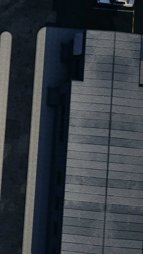Rooftop view of a parking lot under bright sunlight in a bustling city Stock-Footage 331697464