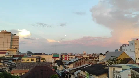 A rooftop views with moon at far Stock Footage 268352730