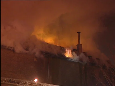 Rooftop of warehouse on fire Stock Footage 655434