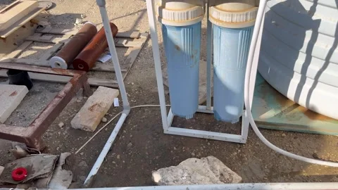 Rooftop Water Filtration System with Dual Blue Housings Video stock 345611795
