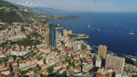 Rooftops and block of flats in Monaco Monte Carlo city France town with Yahts Vídeos de archivo 95399739