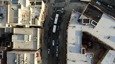 Rooftops and delivery trucks above a Brooklyn side street Stock Footage 102684796