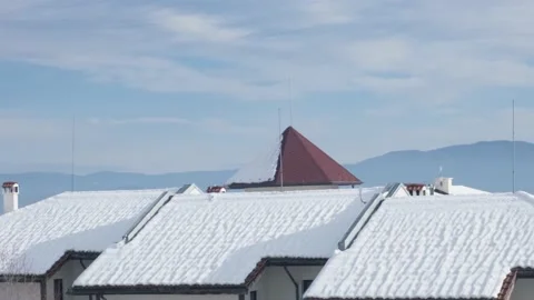 Rooftops covered with snow. Video stock 168613411