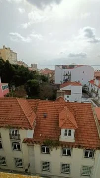Rooftops from a height and a river in the center of Lisbon, Portugal Stock Photos