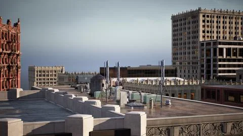 The rooftops of its tallest buildings during a vibrant sunset Ilustración de archivo