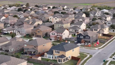 Rooftops over subdivision drone aerial view, close up Stock Footage 256858347
