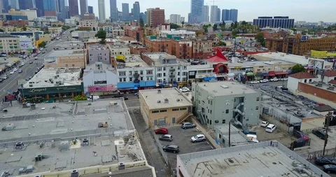 Rooftops push in to city skyline Stock Footage 114031916
