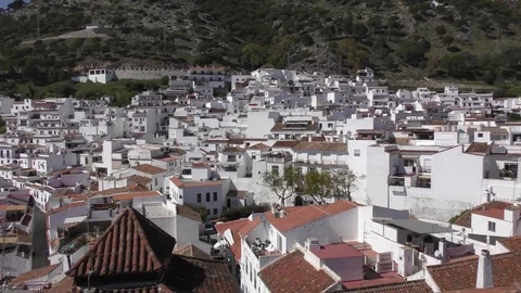 Rooftops red tiles white buildings panning Mijas Stock Footage 74581886