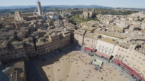 Rooftops of Sienna and piazza del campo and cathedral below Stock Footage 103269341