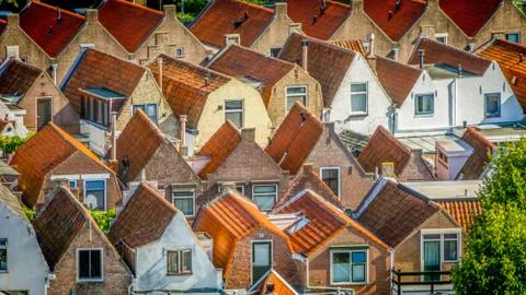 Rooftops of typical Dutch small workers' houses in high density Stock Photos