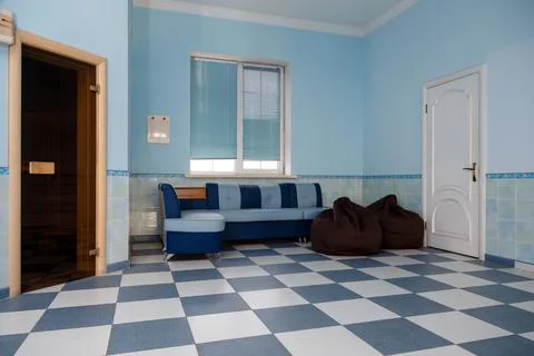 A room with baths and tiles on the ground, preparation for a swimming pool Stock Photos