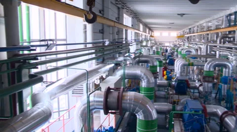 Room With a Complex System of Pipes. View From Left to Right. Power Station Stockbeeldmateriaal 64640285