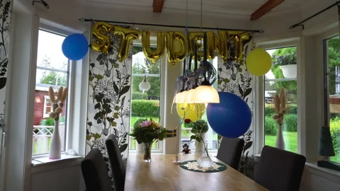 Room decorated for celebration of completion of upper secondary school in Swe Stock Footage 194863422