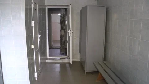 The room is decorated with ceramic tiles. Stock Footage 106776052