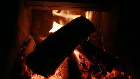 Room in the evening with a small fireplace Stock Footage 205070487