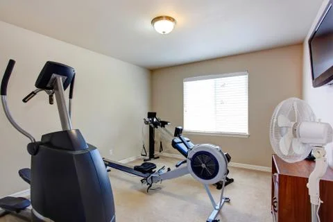 Room with exercise equipment Stock Photos