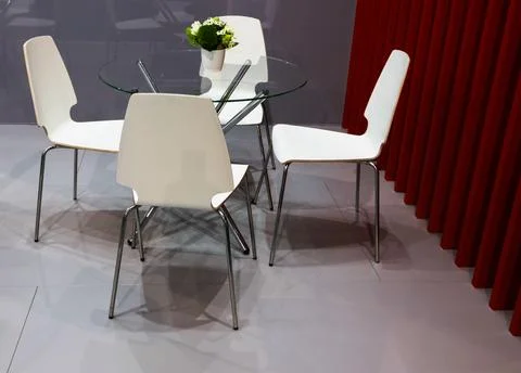 Room with four chairs and one table. Stock Photos
