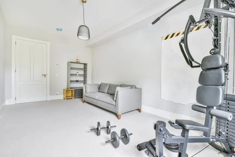 A room with a gray soft sofa Stock Photos