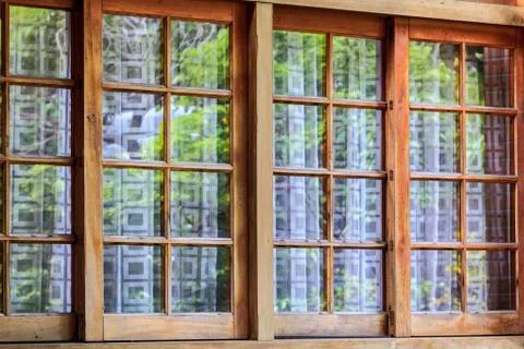 Room interior with window view green tree,Japanese style Stock Photos