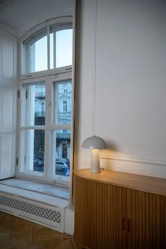 A room with a large window Stock Photos