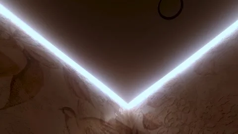 Room with a lighted ceiling. Neon lighting in the room. Stock Footage 303232525